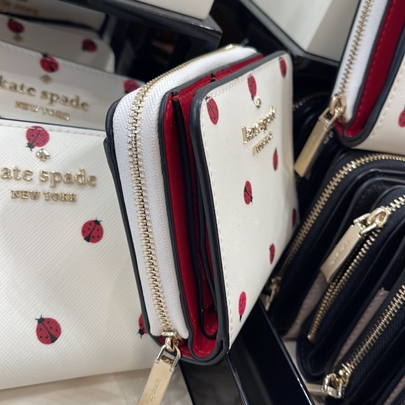 Kate Spade Staci Small Ladybug Zip Around Wallet
COLOR:
Cream Multi - Picture 3 of 16